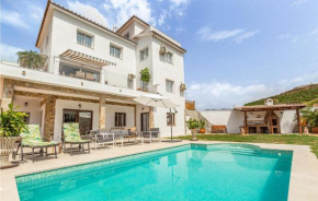 Amazing home in Mezquitilla with Outdoor swimming pool, WiFi and 4 Bedrooms